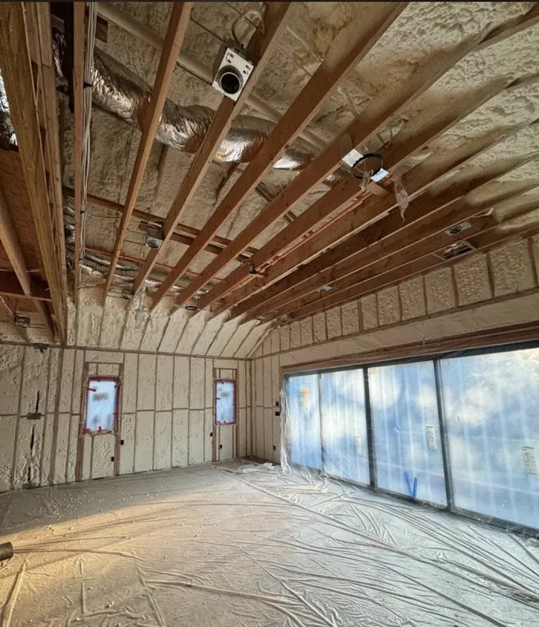 Interior walls and ceiling insulated with spray foam during new construction in Piedmont